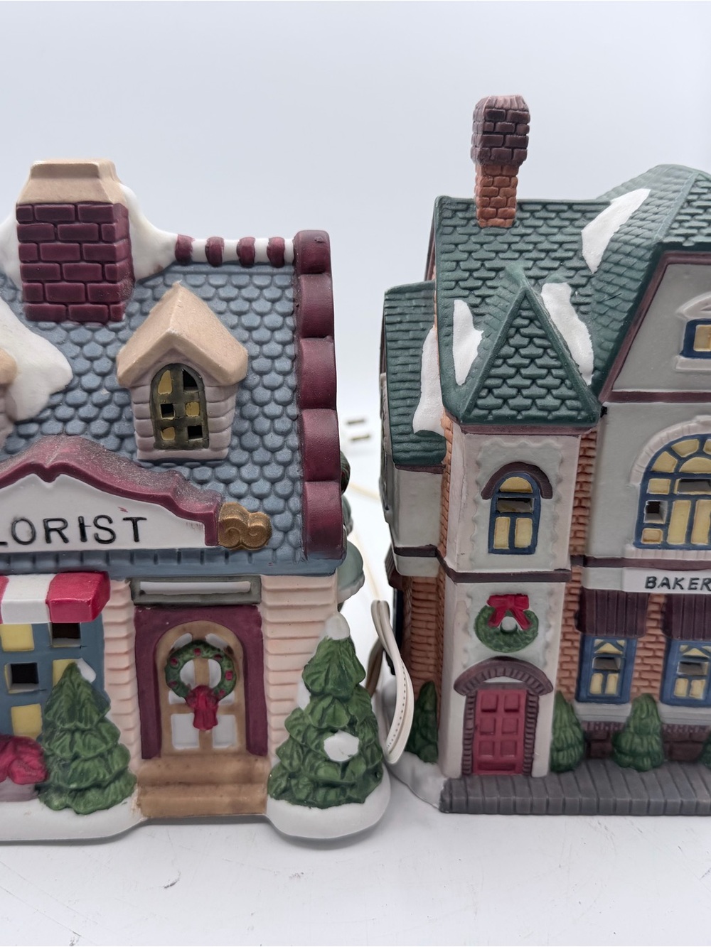 Two Christmas village grand Noel snowflake village